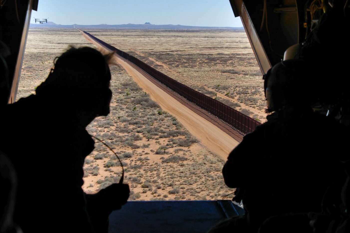 Acting Secretary of Defense Patrick Shanahan, left, aboard an Osprey aircraft during a tour...