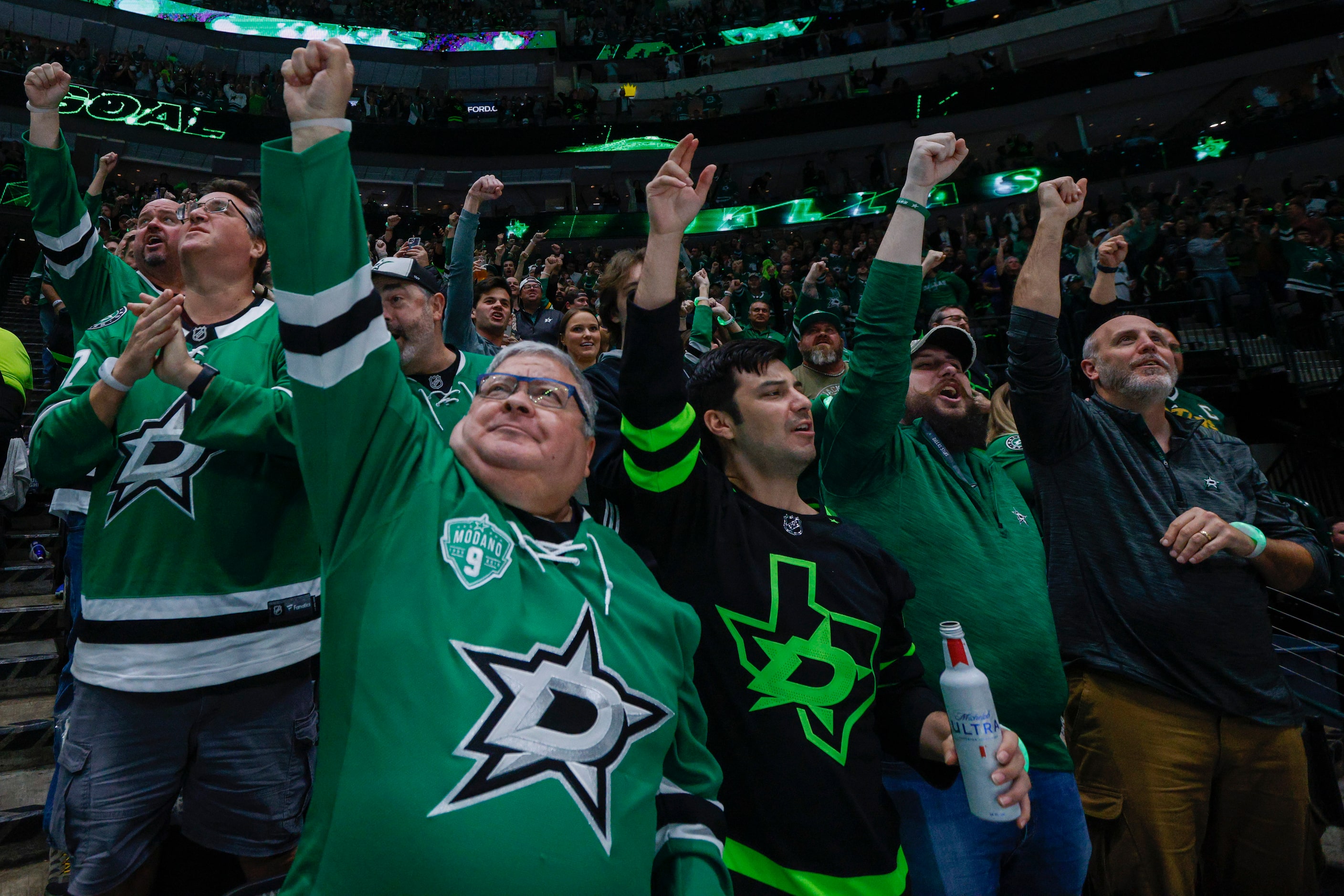 Dallas Stars fans celebrate a goal by Dallas Stars center Roope Hintz (24) during the first...