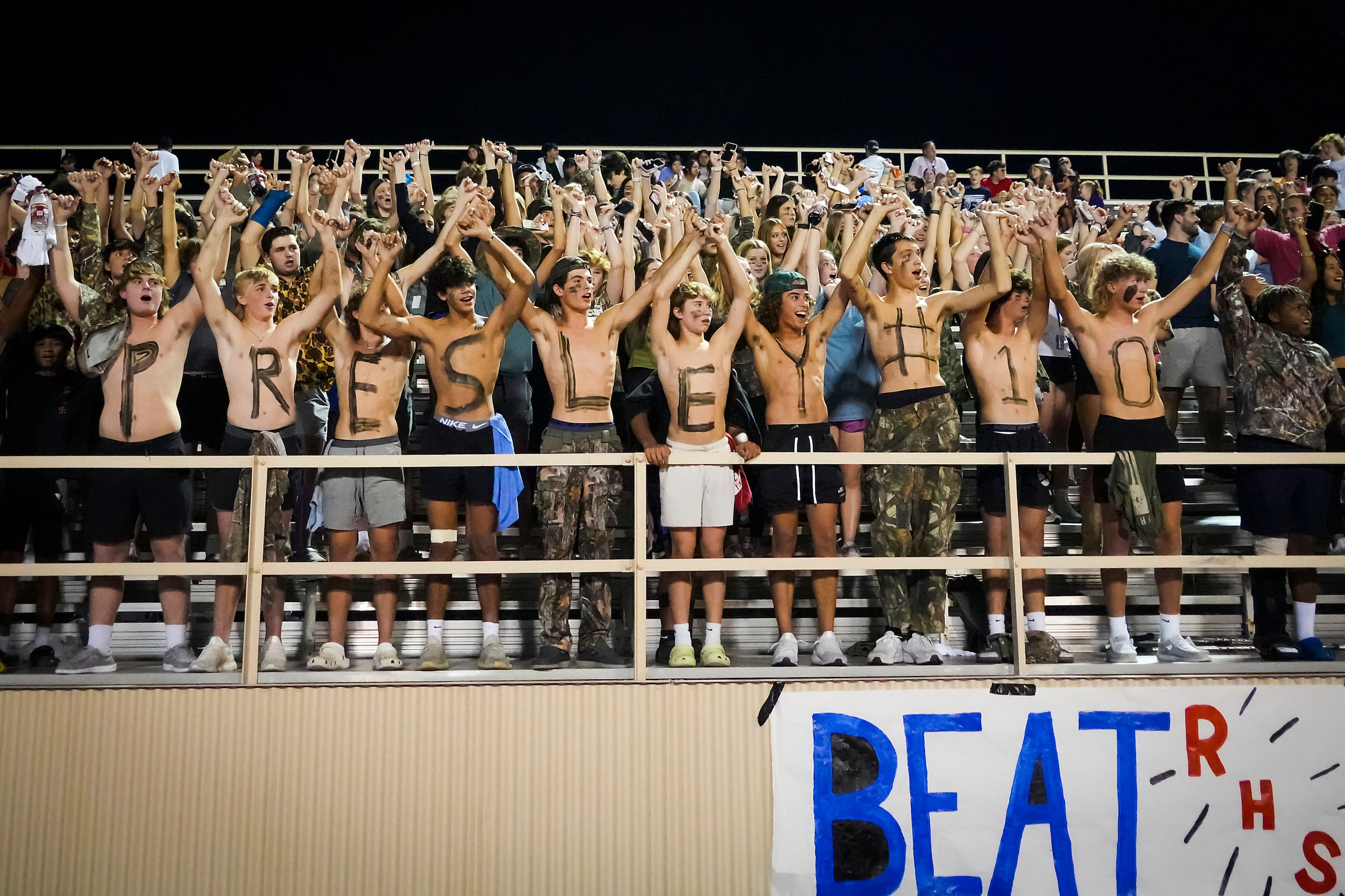 Richardson Pearce fans show their appreciation for quarterback Presley Harper after a score...