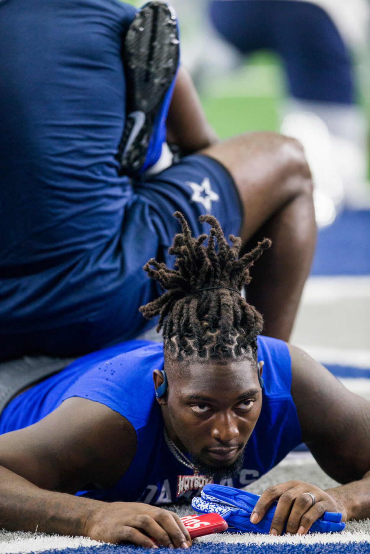 Dallas Cowboys defensive end Demarcus Lawrence (90) warms up before an NFL game between the...