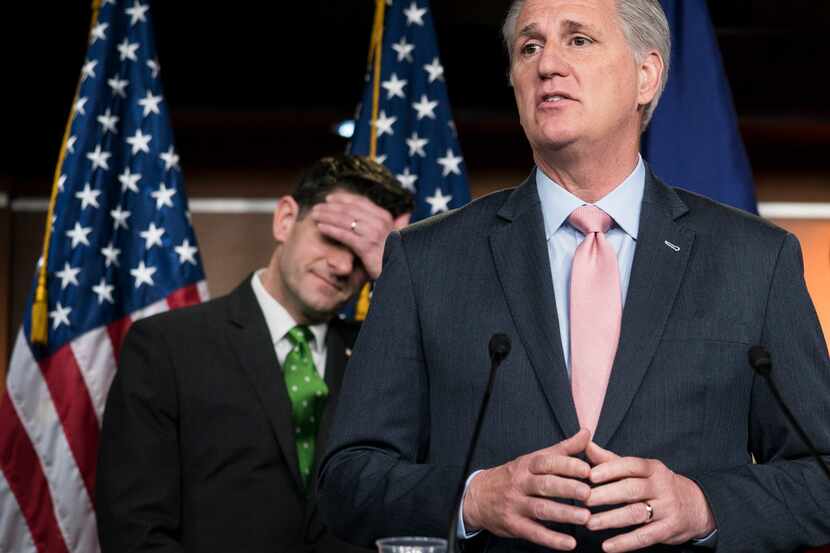 Kevin McCarthy (R-Calif.), House majority whip, speaks, and House Speaker Paul Ryan (R-Wis.)...