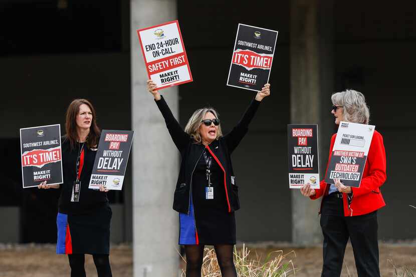 Southwest Airlines flight attendant Dixie Cunningham, center, during a picketing at the...