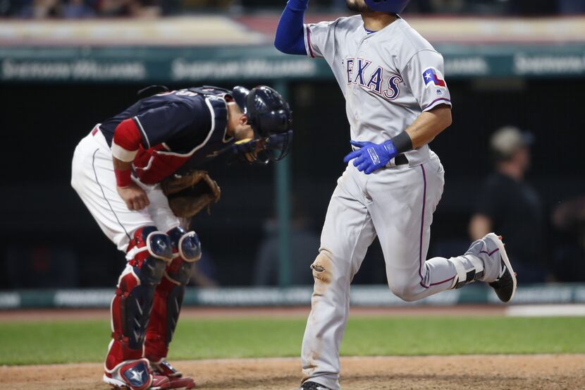 CLEVELAND, OH - MAY 01: Isiah Kiner-Falefa #9 of the Texas Rangers celebrates after hitting...