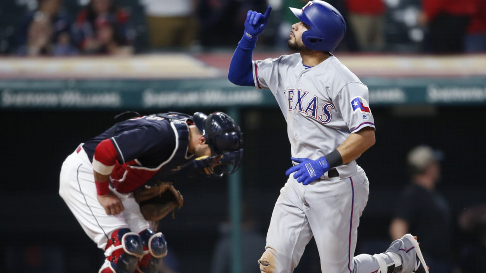 CLEVELAND, OH - MAY 01: Isiah Kiner-Falefa #9 of the Texas Rangers celebrates after hitting...