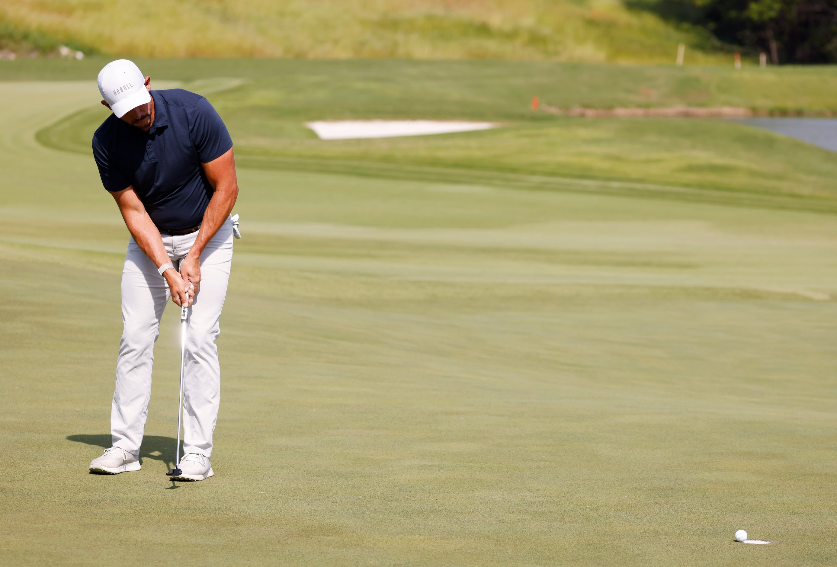 Scott Stallings sinks a birdie on the 14th hole during round 3 of the AT&T Byron Nelson  at...