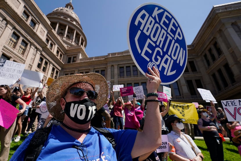 FILE - Abortion rights demonstrators attend a rally at the Texas Capitol, Saturday, May 14,...