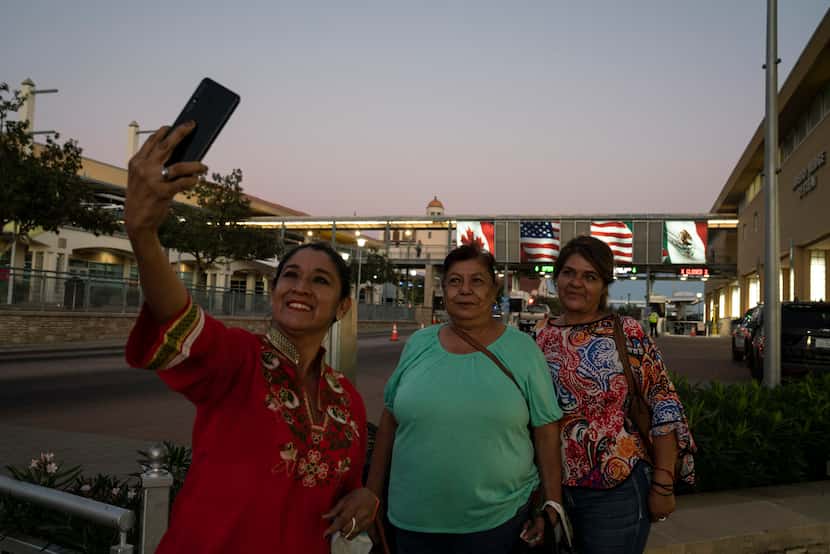 Mexican residents Rossy Perez (left), 51, Eva Contreras (center), 66, and Ceci Perez, 52,...