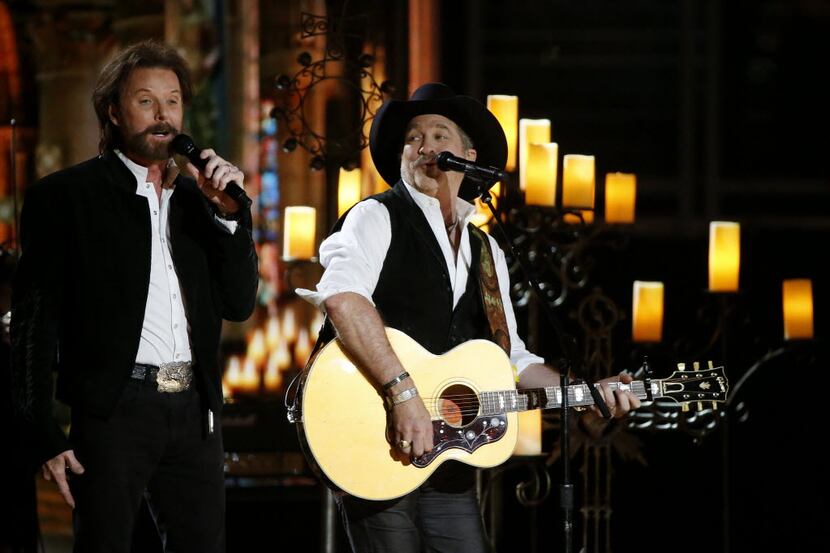 Brooks & Dunn perform during the 2015 Academy of Country Music Awards at AT&T Stadium in...