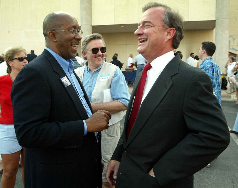 FILE - U.S. Senate Democratic candidate Ron Kirk shares a moment with Democratic candidate...