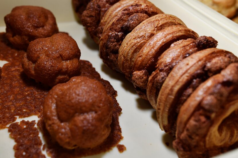 Honey Butter, left, and a Crispy Almond creme puffs, from Beard Papa's in Frisco.