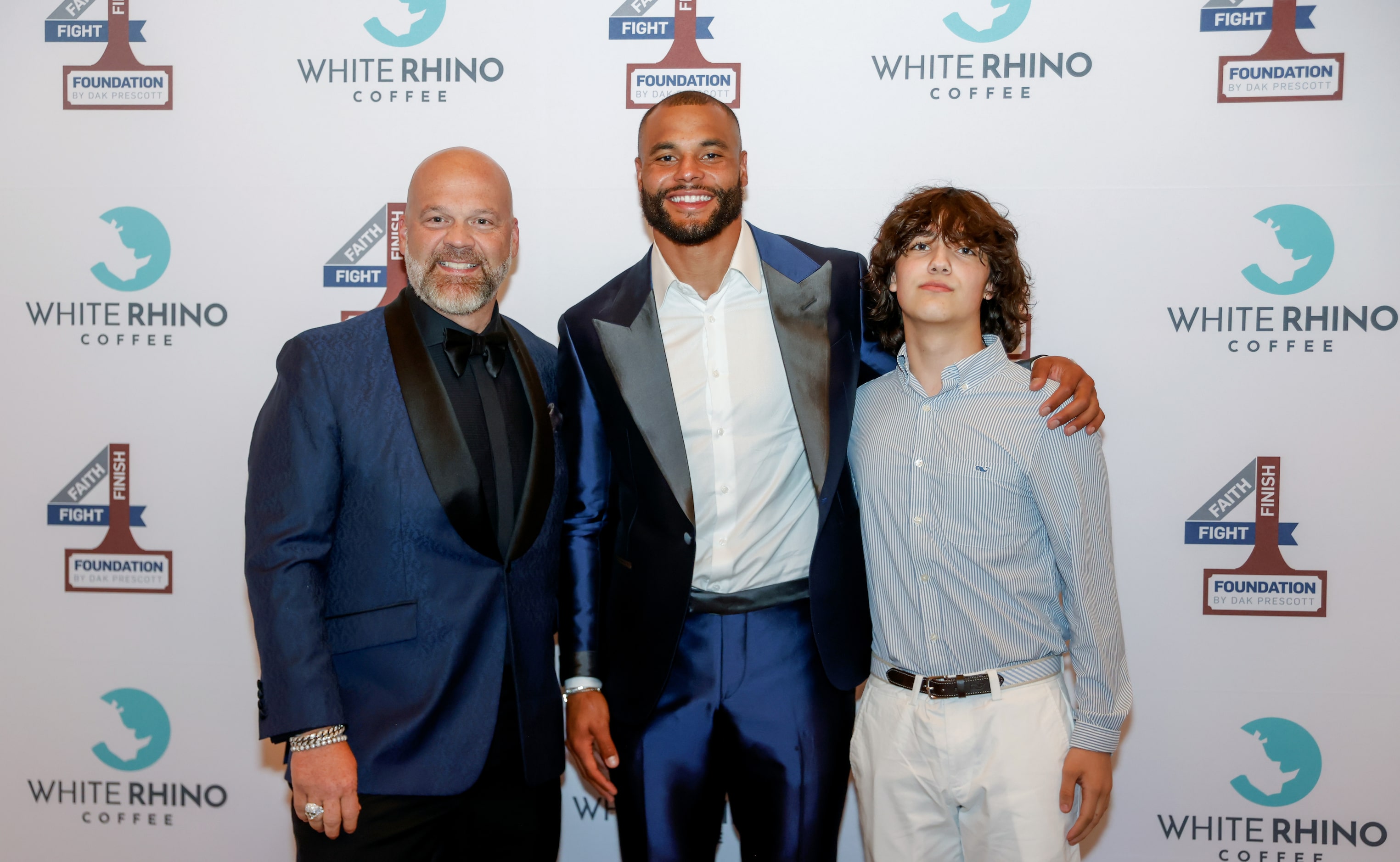 White Rhino Coffee + Kitchen founder Chris Parvin (left), Dallas Cowboys quarterback Dak...