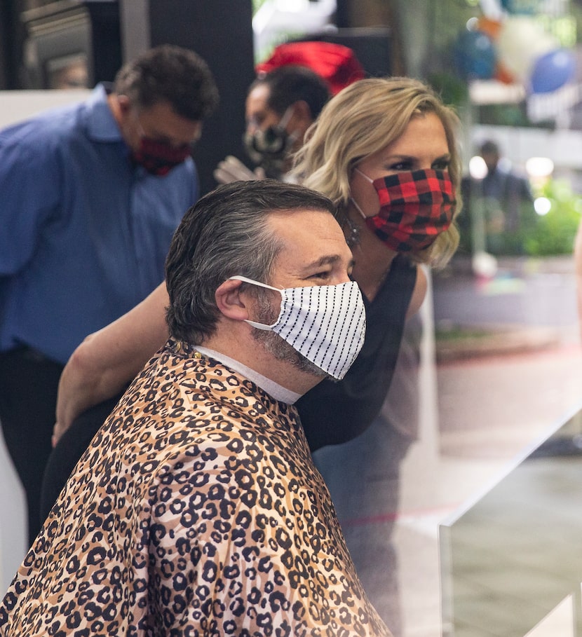 Sen. Ted Cruz chats with Salon a la Mode owner Shelley Luther before getting a haircut on...