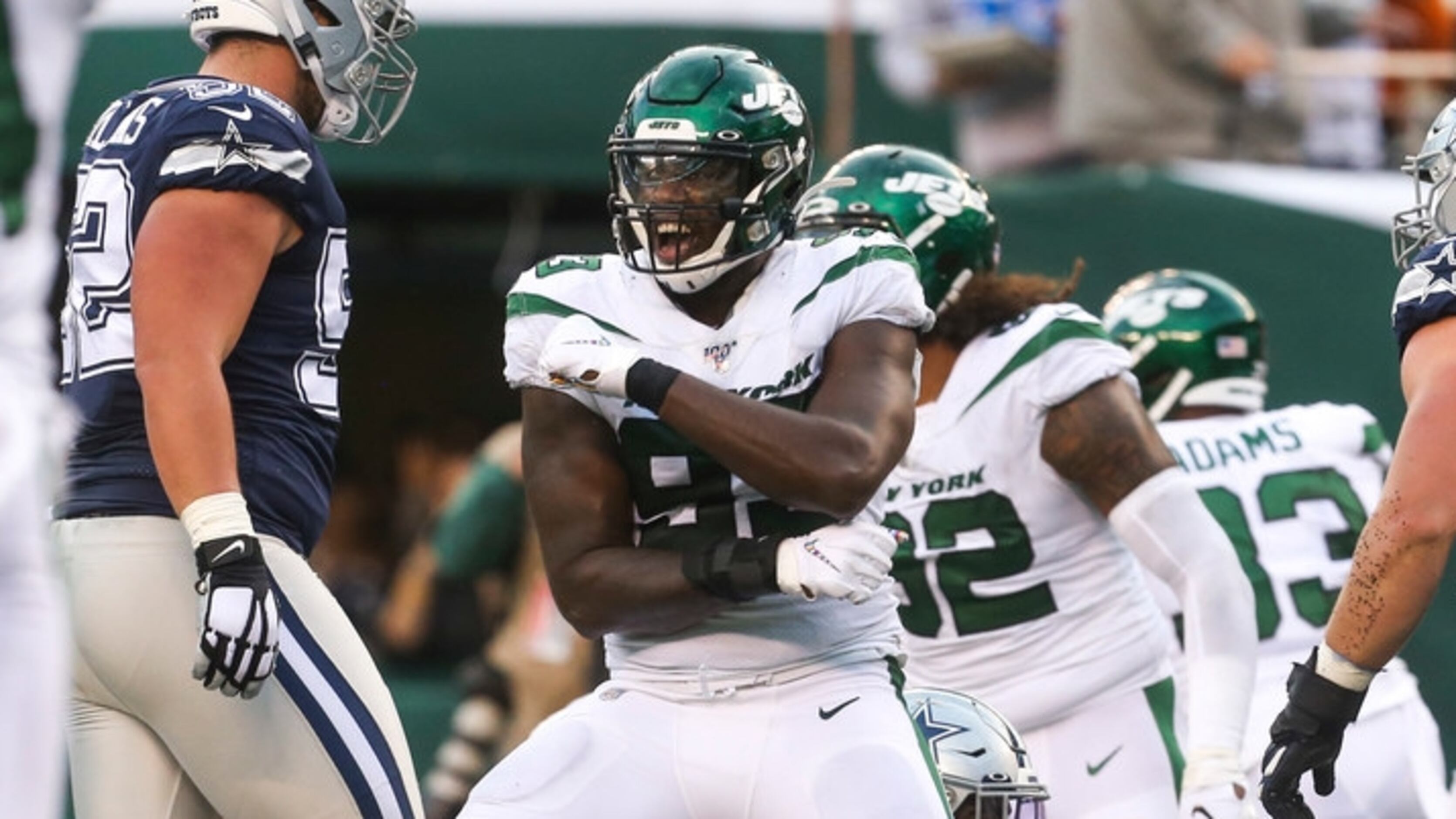 Dallas Cowboys defensive end Tarell Basham (93) walks on the field