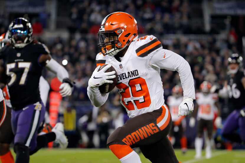 FILE - Cleveland Browns running back Duke Johnson rushes the ball in the second half of an...