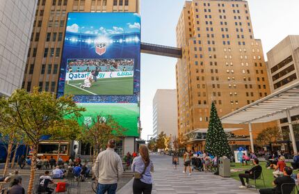 The AT&T Discovery District has a large screen on the side of a building at AT&T's world...