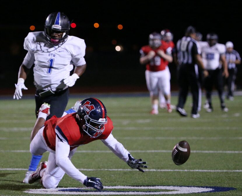 McKinney Boyd wide receiver Stephen Driskell (3) is unable to make a catch while being...