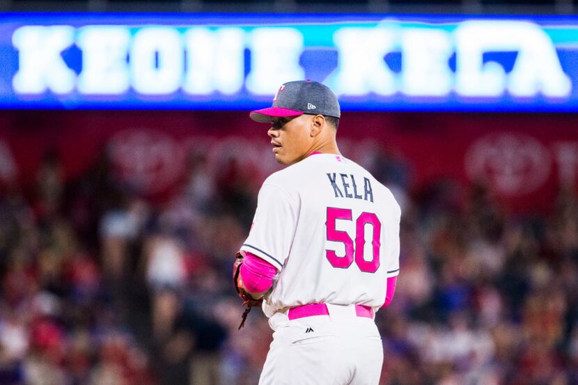 Texas Rangers relief pitcher Keone Kela (50) prepares to pitch during the eighth inning of...