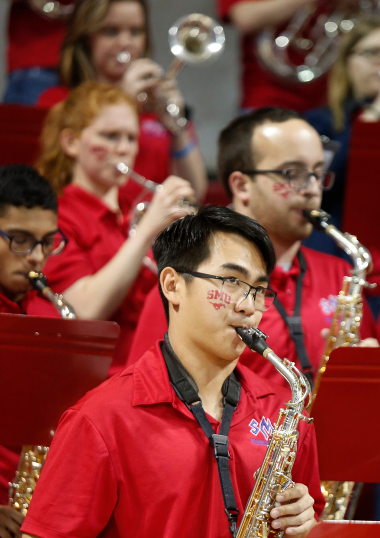 Members of the SMU Mustangs band perform the national anthem before the beginning of the SMU...