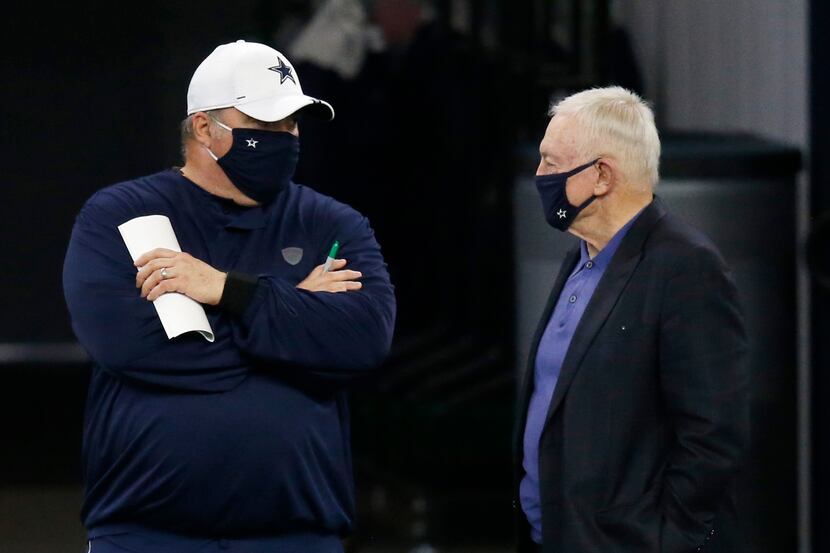 FILE — Dallas Cowboys head coach Mike McCarthy talks to Dallas Cowboys owner and general...