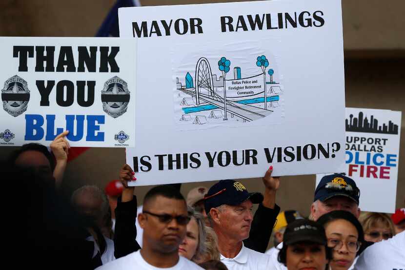 Dallas police and fire retirees held a protest rally at Dallas City Hall in April after...