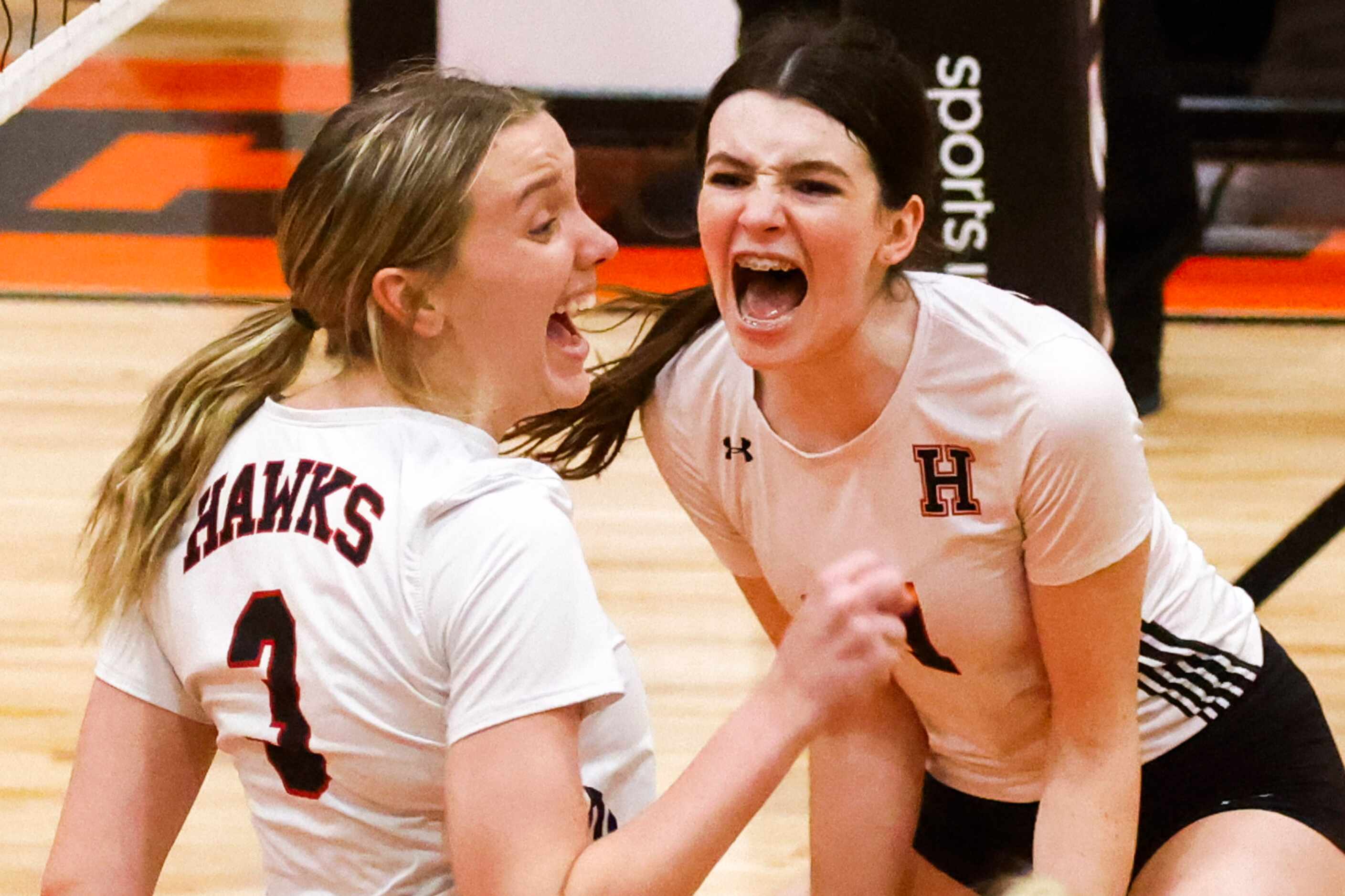 Rockwall Heath’s Dakoda Hood (left) and Gabby McHenry cheer after a point against Rockwall...