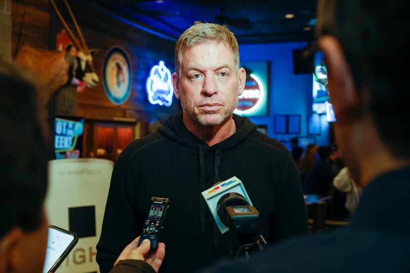 Troy Aikman listens to questions from reporters during an event for his new light beer Eight...