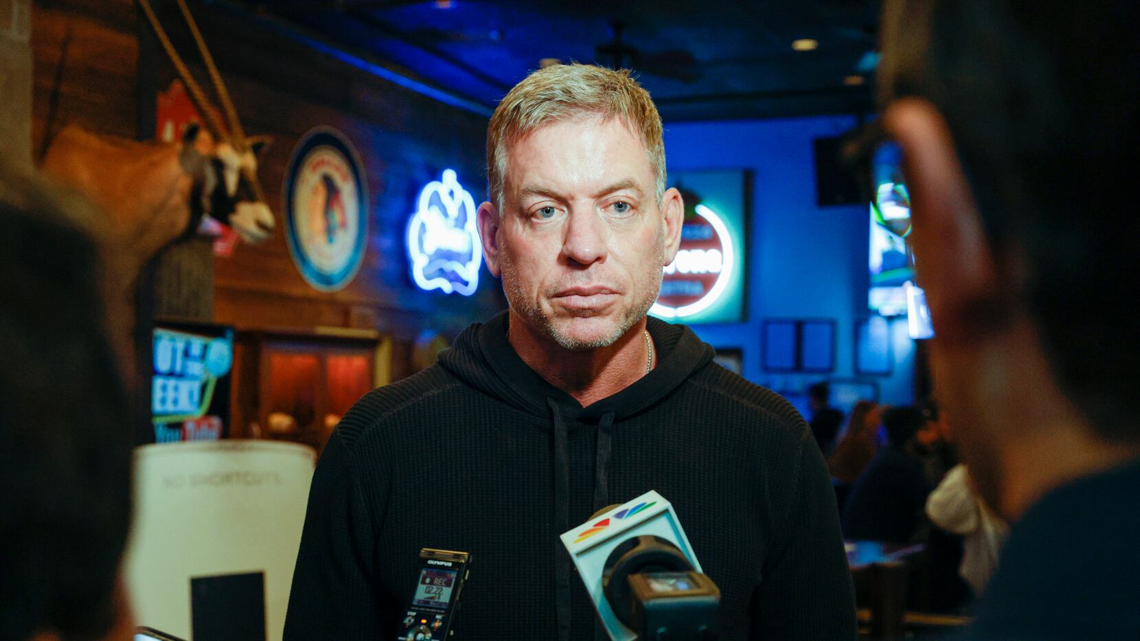 Troy Aikman listens to questions from reporters during an event for his new light beer Eight...