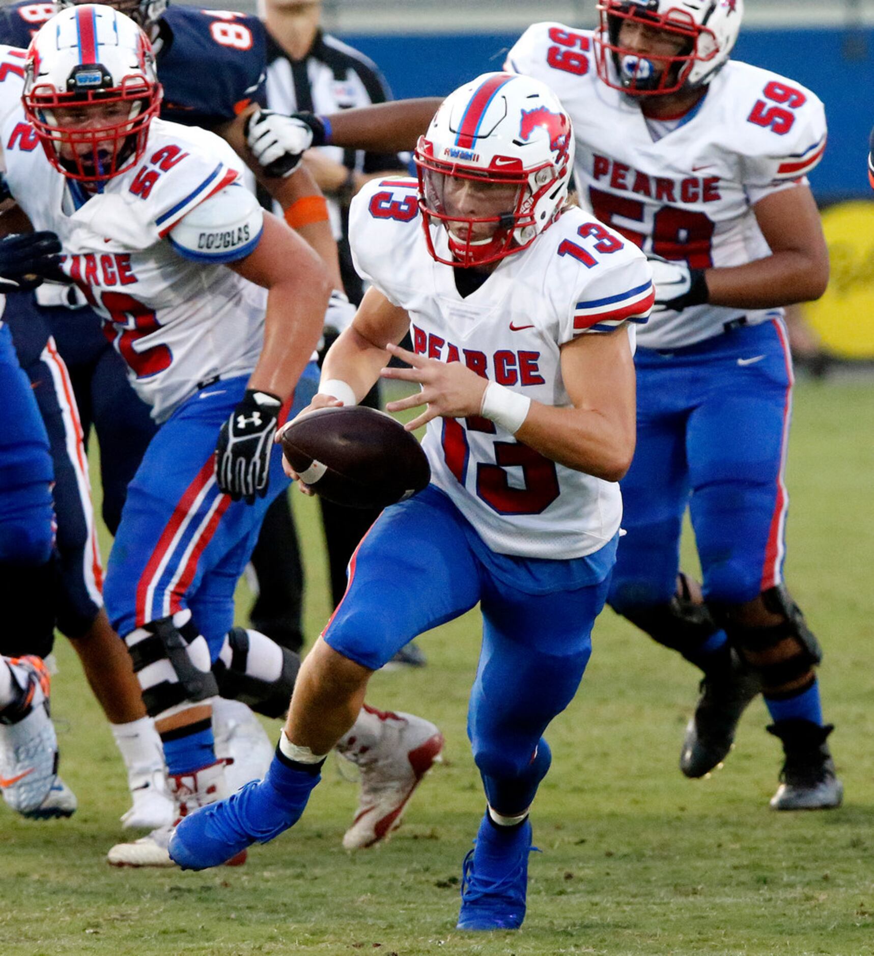 Richardson Pearce High School quarterback Blake Waters (13) during the first half as Frisco...