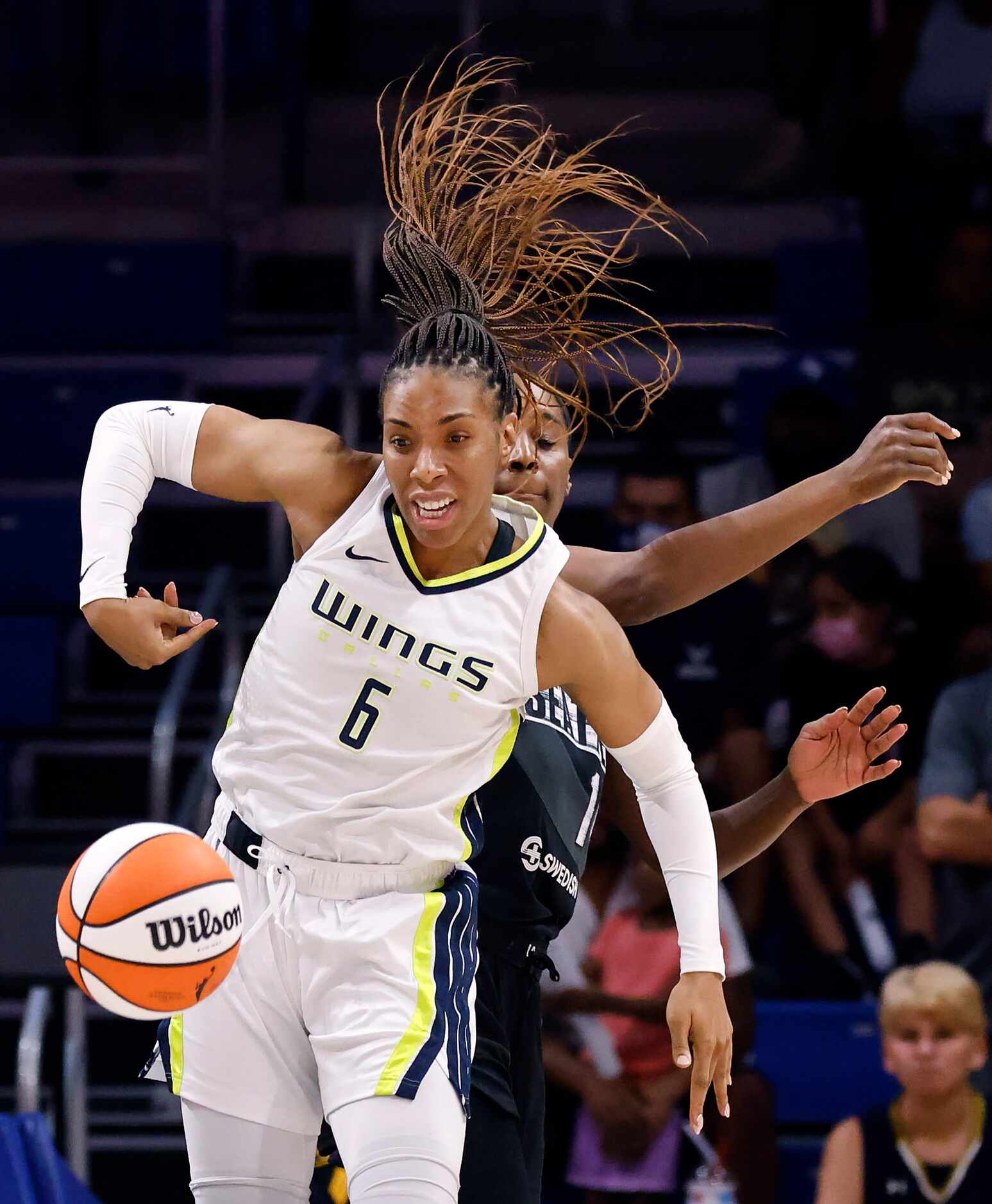 Dallas Wings forward Kayla Thornton (6) tries to rebound the ball against Seattle Storm...