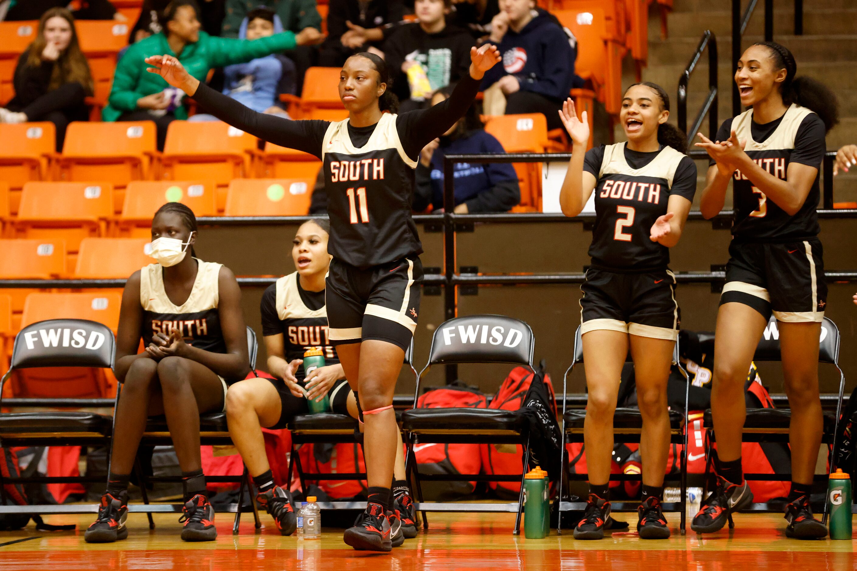 South Grand Prairie players Adhel Tac, Victoria Dixon, Jahcelyn Hartfield (11), Ahrianna...