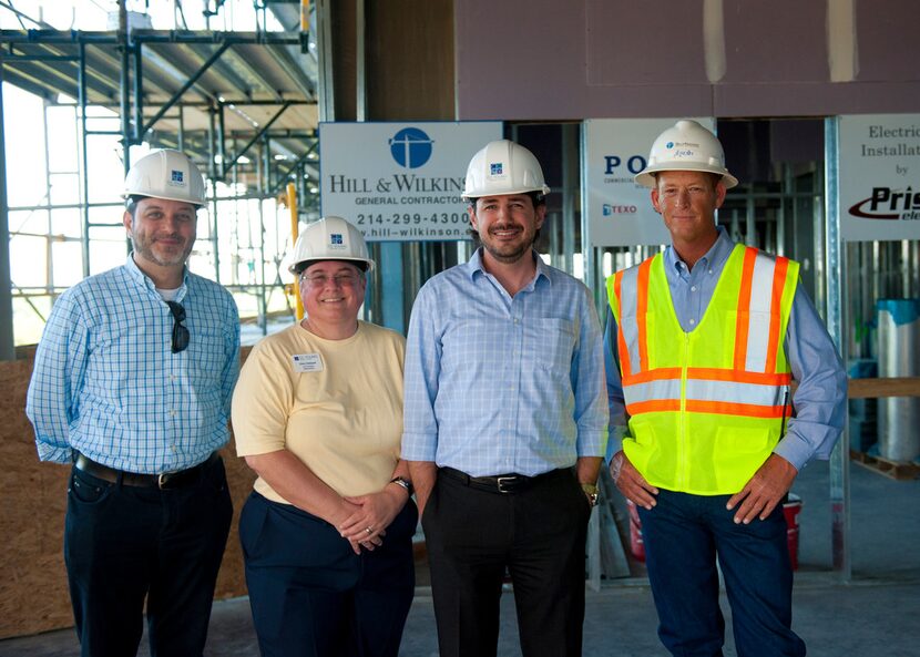 From left: D2  architect  principal  Grant  Warner,  C.C.  Young  director  of  human ...