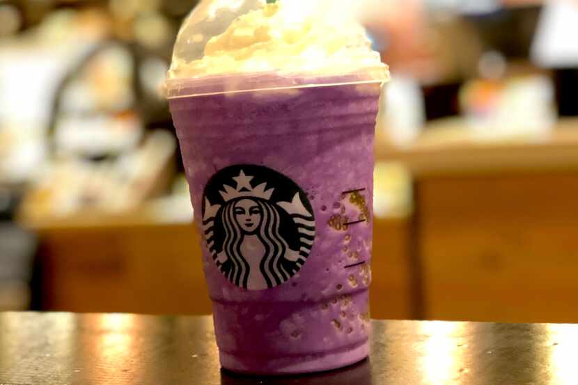 Starbucks' new Halloween drink is a Witch's Brew Creme Frappuccino. It has "lizard scales"...