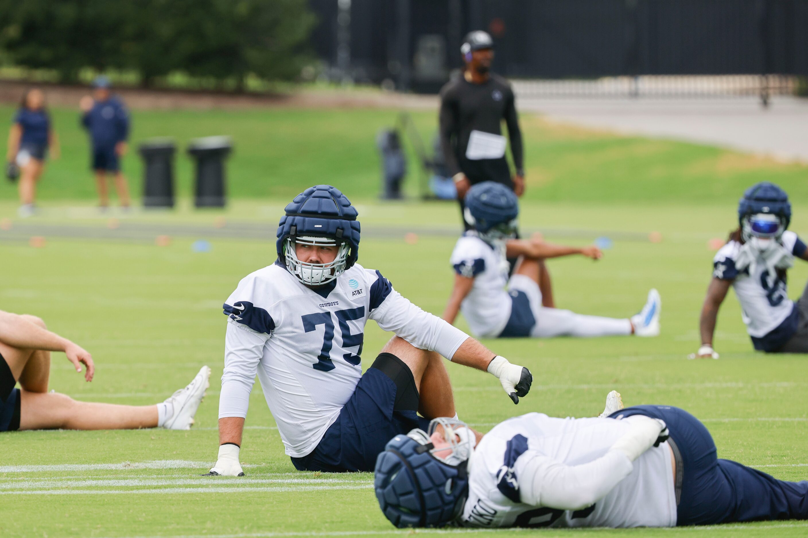 Dallas Cowboys offensive tackle Josh Ball (75) stretches during a team practice, on Monday,...