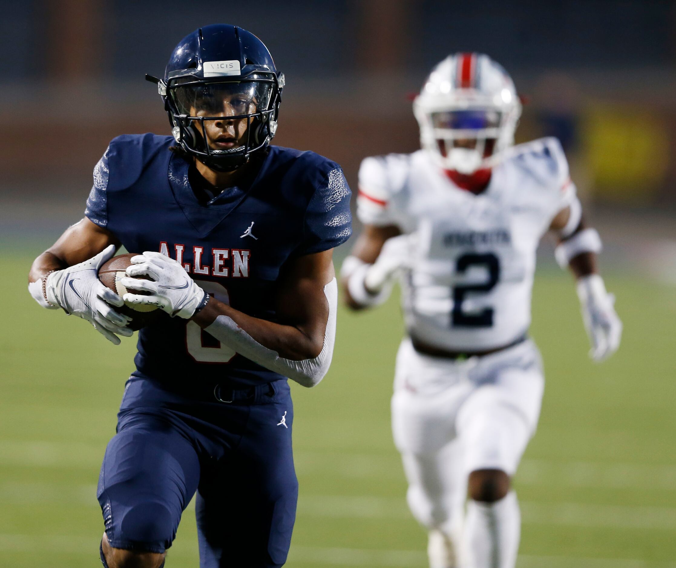 Allen's Blaine Green (8) runs to the end zone for a touchdown in front of Humble...