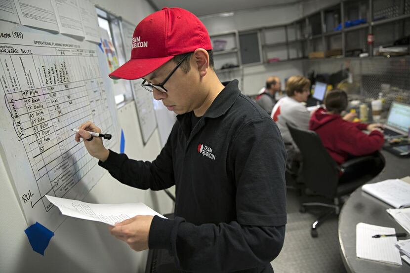 Volunteer Albert Yao works in the Team Rubicon Mobile Command Center.