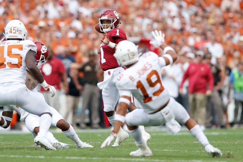 FILE - Oklahoma quarterback Kyler Murray (1) attempts a pass during the first half of the...