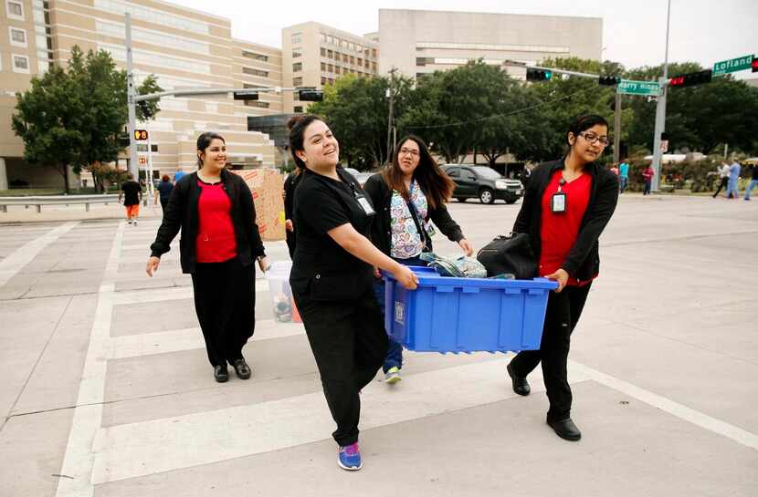 Vanessa Rios (front left)  and Dolores Contreras (front right) were among workers who made...