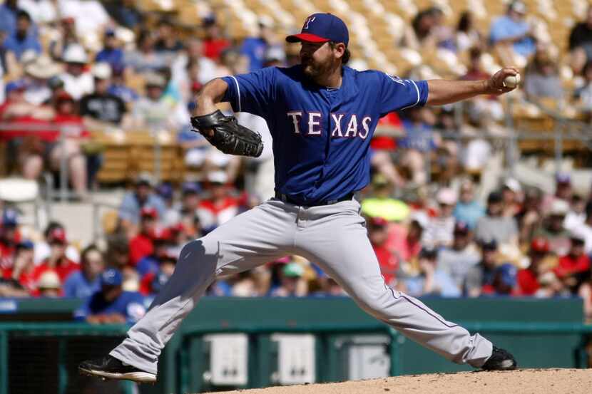 Mar 11, 2014; Phoenix, AZ, USA; Texas Rangers pitcher Joe Saunders (47) throws in the first...