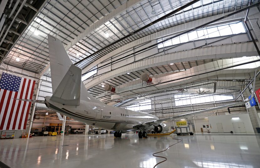 Hillwood Airways' B737-700C aircraft parked in a hangar at Fort Worth Alliance Airport. (Jae...