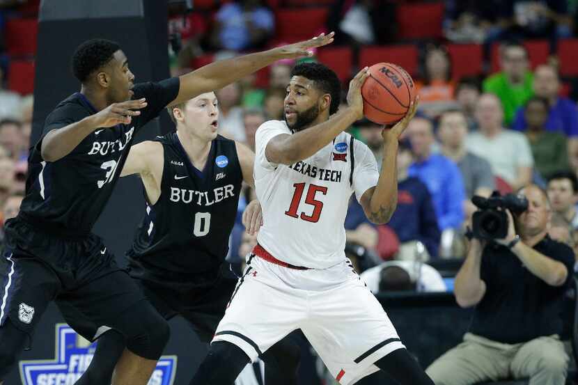 FILE - In this March 17, 2016, file photo, Texas Tech forward Aaron Ross (15) works against...