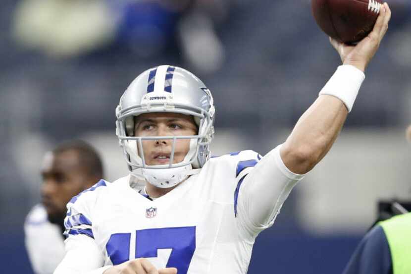 Dallas Cowboys quarterback Kellen Moore (17) throws the ball during warmups before a game...