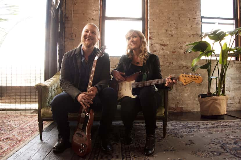 Susan Tedeschi and Derek Trucks of the Tedeschi Trucks Band pose together.