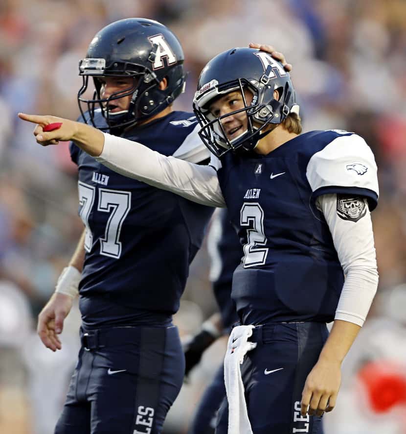 Allen's Peter Nicklas (77) congratulates Mitchell Jonke on his touchdown during the first...