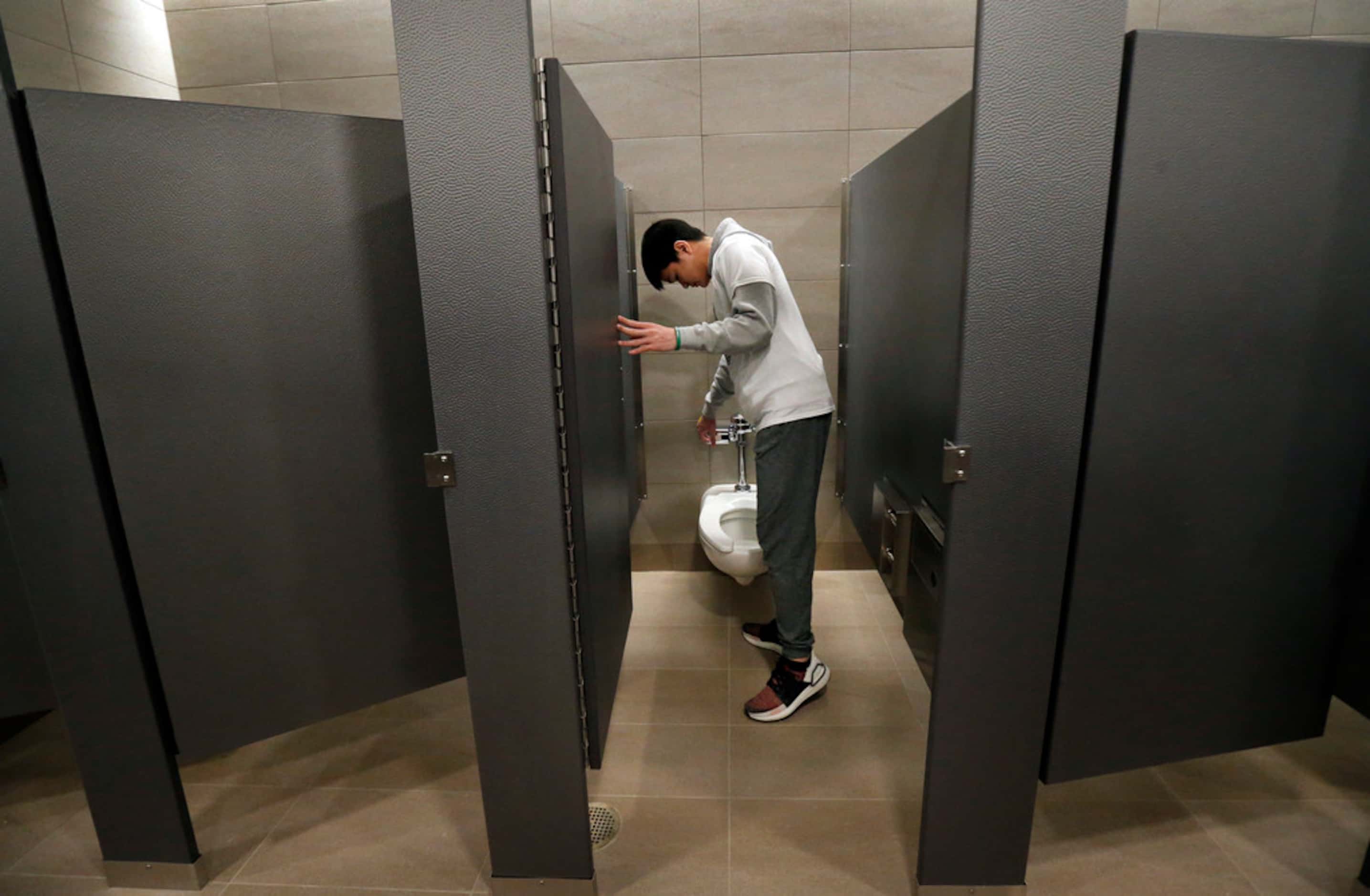 Arlington High School student Tri Nguyen participated in the Super Flush, a mass flushing of...