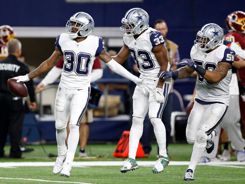 Dallas Cowboys cornerback Anthony Brown (30) celebrates his fourth quarter interception with...