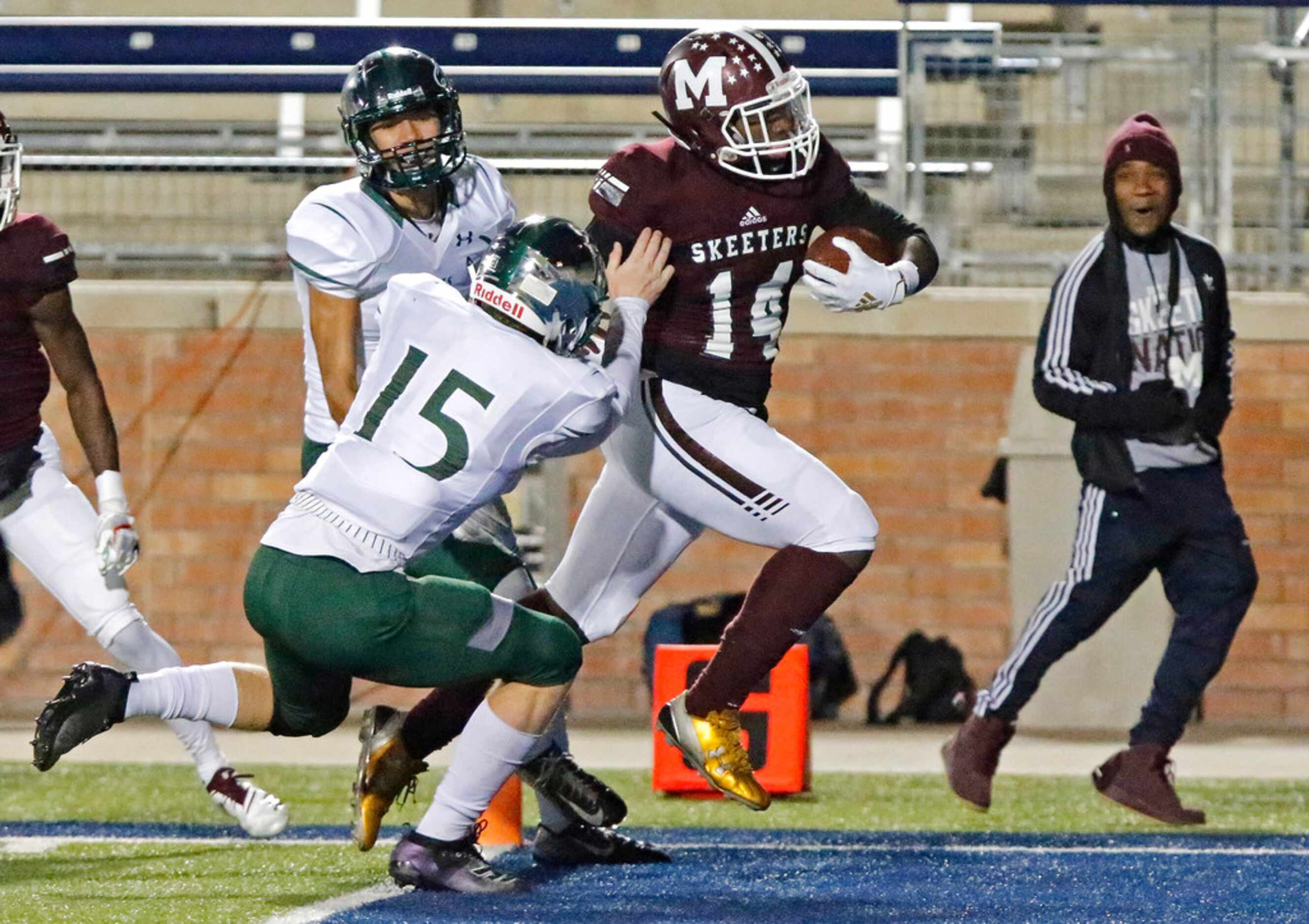 Mesquite High School wide receiver R.J. Bonner (14) crosses the goal line in front of...