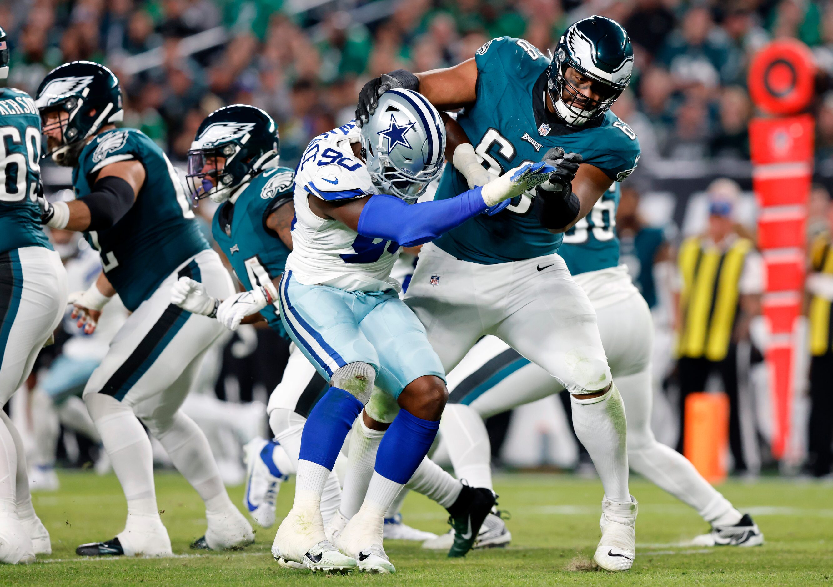 Philadelphia Eagles offensive tackle Jordan Mailata (68) manhandles Dallas Cowboys defensive...