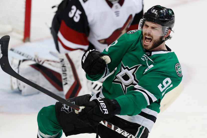 Dallas Stars center Tyler Seguin (91) reacts after scoring a goal against Arizona Coyotes...