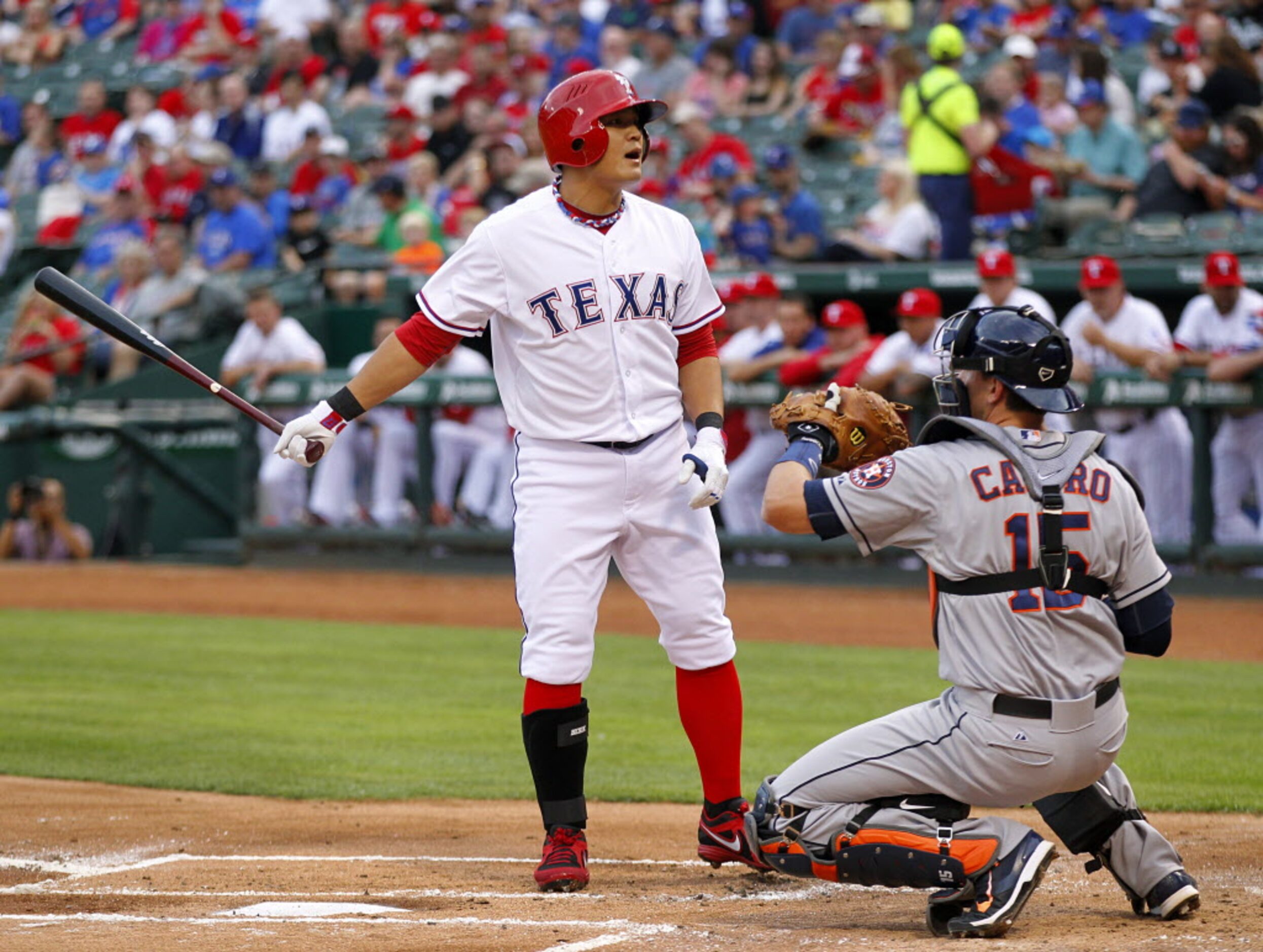 Texas Rangers left fielder Shin-Soo Choo (17) reacts to the umpires called strike in the...