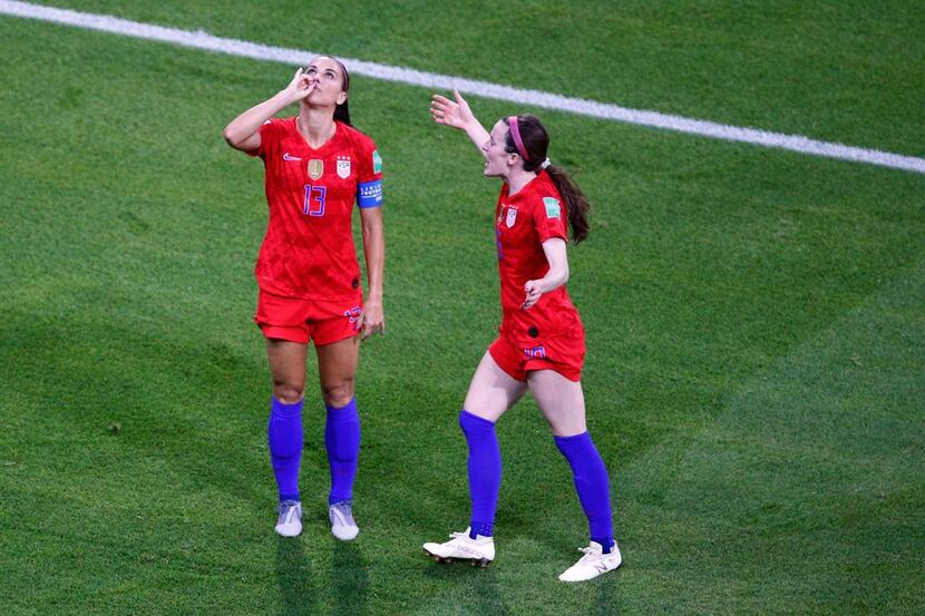 United States' Alex Morgan, left, celebrates her side's second goal during the Women's World...